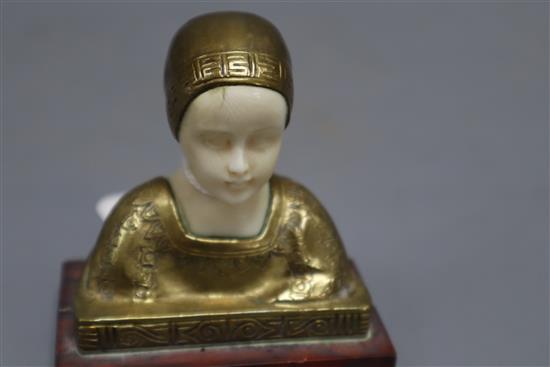 A bronze and ivory bust of a girl, height 8cm